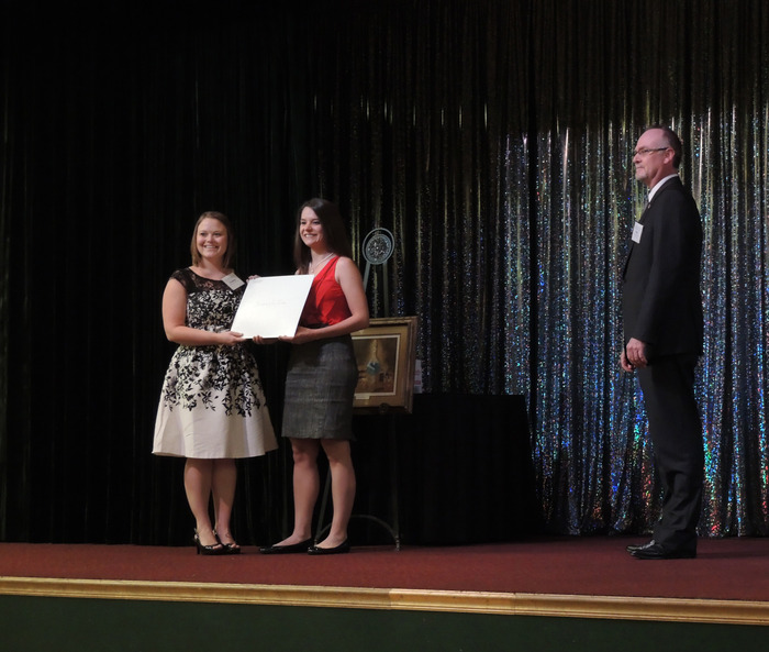 Aunt presents Wall License to Rebekah Lautensack